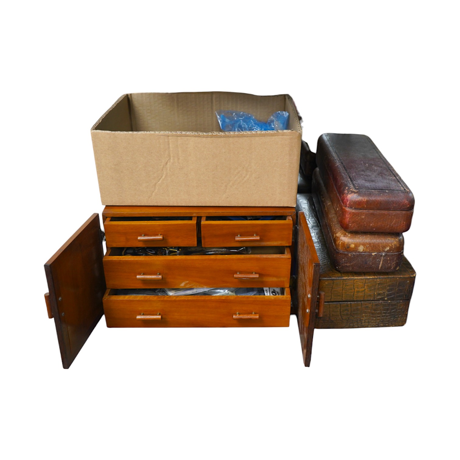 Coins, medals, medallions and badges, mainly 20th century British and European issue contained within a wooden cabinet, together with three leather boxes with padddd and lined interiors. Condition - fair.